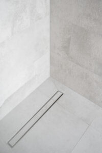 hidden shower drain in a tile shower